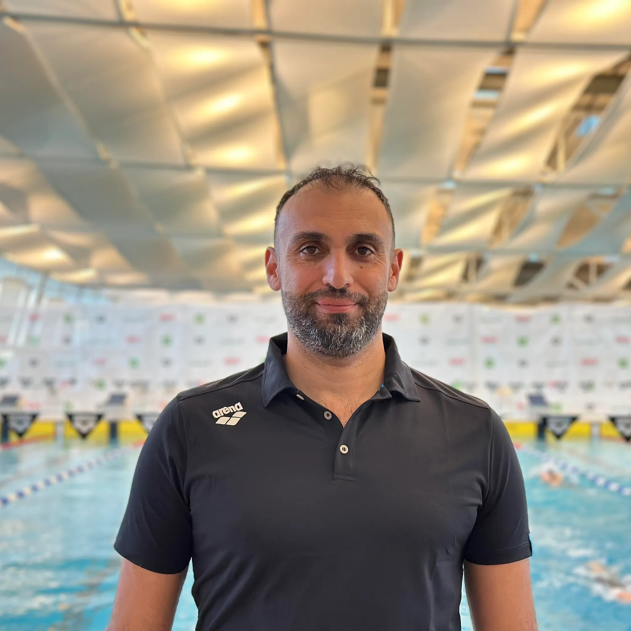 Swim instructor teaching swimming